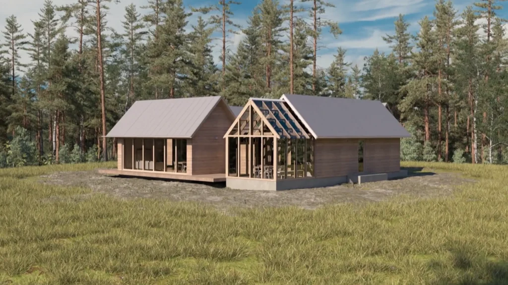 Stiligt - Ett modernt trähus med stora fönster och en glastaksdel står på en gräsbevuxen glänta omgiven av höga träd under en blå himmel.