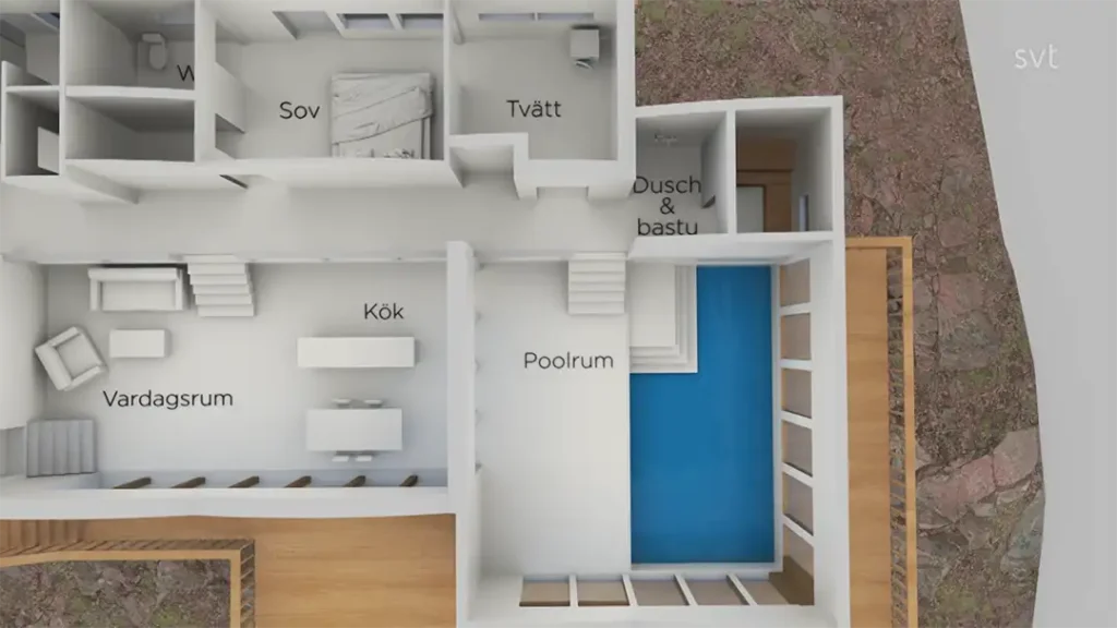 Stiligt - En planlösning på ett hus som visar ett vardagsrum, kök, sovrum, tvättstuga, dusch och bastu samt ett inomhuspoolrum.