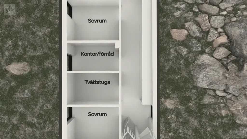 Stiligt - En top-down vy av en byggnadsplan med rum märkta på svenska: två "Sovrum" (sovrum), "Kontor/förråd" (kontor/förråd) och "Tvättstuga" (tvättstuga); omgiven av gräs och stenar.