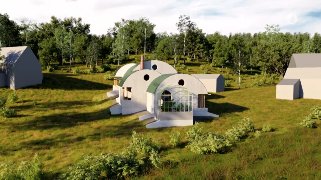 Stiligt - Ett modernt hus med svängda tak och stora fönster ligger i en gräsbevuxen glänta omgiven av träd, med en annan liknande byggnad i bakgrunden.