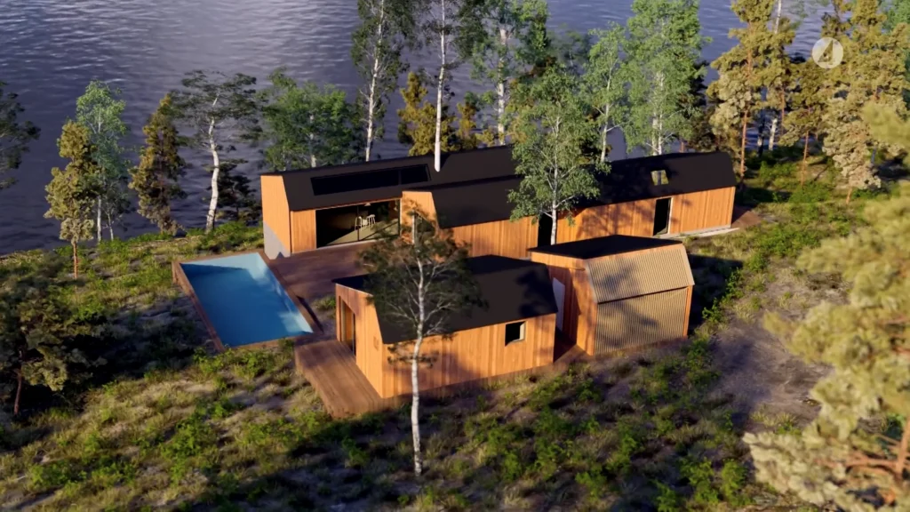 Stiligt - Ett kluster av moderna trästugor med svarta tak ligger bland träd nära en vattenmassa, med en rektangulär utomhuspool och trädäck.
